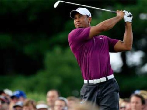 Scott takes lead as Woods makes encouraging return Scott takes lead as Woods makes encouraging return