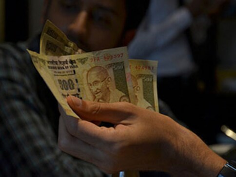 The rupee has slipped to 50 against the dollar. Here's why