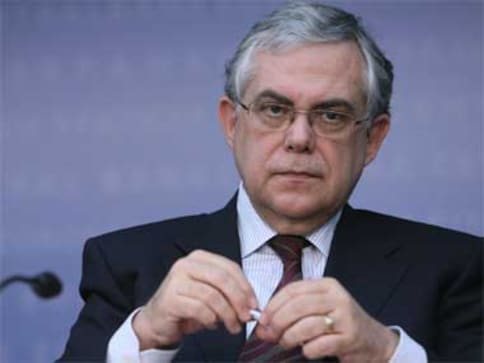 Athens: Former Greek PM Lucas Papademos injured in booby-trap blast Athens: Former Greek PM Lucas Papademos injured in booby-trap blast