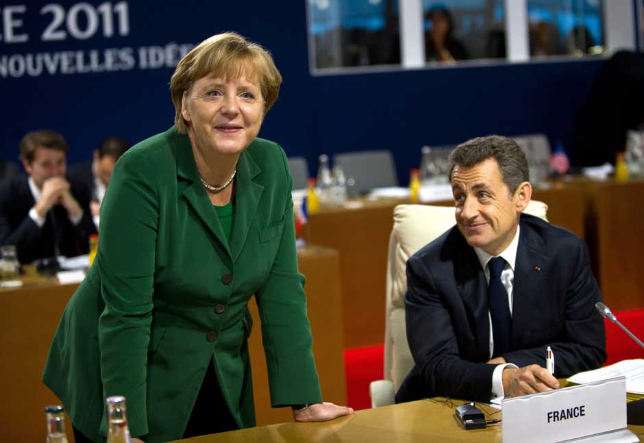 Sarkozy: She's damned right. AP Sarkozy: She's damned right. AP