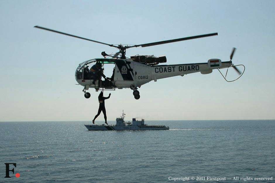 A stranded fisherman being rescued. A stranded fisherman being rescued.