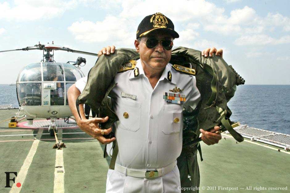 Man in white: Commander SP Sharma. Man in white: Commander SP Sharma.