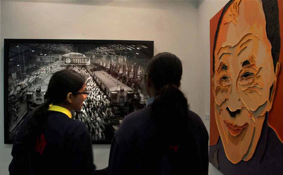 Visitors admire an art-piece displayed at the India Art Fair. PTI Visitors admire an art-piece displayed at the India Art Fair. PTI
