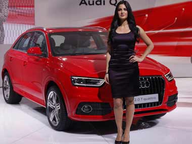 Geneva Motor Show almost void of booth babes, as automakers strive to polish their brand images