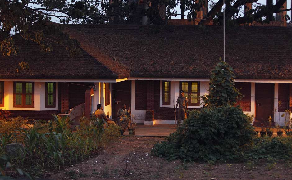 Indian policemen guard the government guest house where the two members of the security crew of Italian cargo vessel, the Enrica Lexie are kept in custody for allegedly shooting two Indian fishermen to death, in Kochi. AP Indian policemen guard the government guest house where the two members of the security crew of Italian cargo vessel, the Enrica Lexie are kept in custody for allegedly shooting two Indian fishermen to death, in Kochi. AP