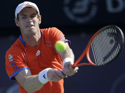 Murray fights back to win first round at Dubai Murray fights back to win first round at Dubai