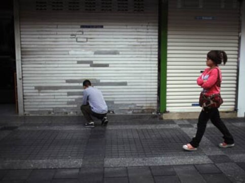 China's unofficial lending falters, savers protest China's unofficial lending falters, savers protest