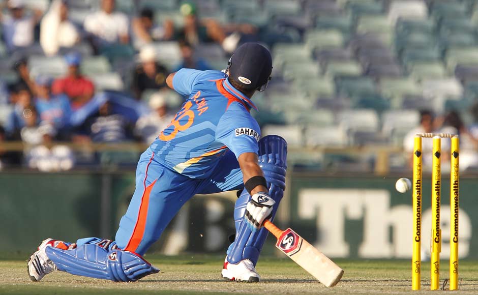 India's Suresh Raina scraps into his crease against Sri Lanka. AP Photo India's Suresh Raina scraps into his crease against Sri Lanka. AP Photo