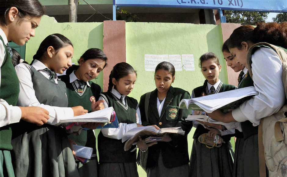 12th standard students giving a last look to their notes as they prepare to appear in their CBSE exams at an examination centre in Moradabad on Thursday. PTI 12th standard students giving a last look to their notes as they prepare to appear in their CBSE exams at an examination centre in Moradabad on Thursday. PTI