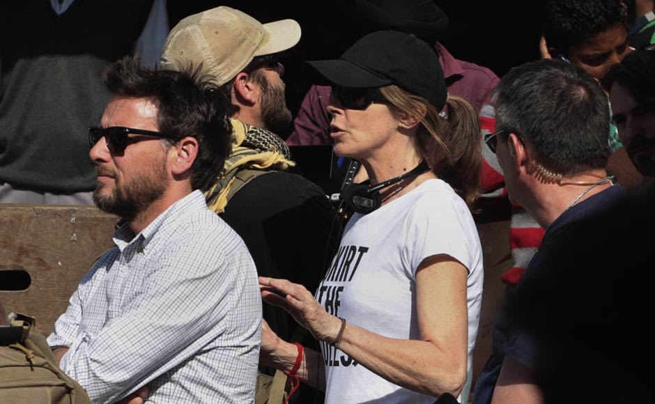 Director Kathryn Bigelow, centre, stands on the set during shooting for her upcoming film about Osama bin Laden in Chandigarh. AP Director Kathryn Bigelow, centre, stands on the set during shooting for her upcoming film about Osama bin Laden in Chandigarh. AP