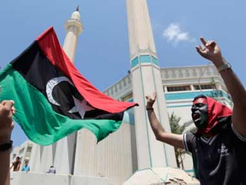 Libya buries 170 bodies found in mass grave