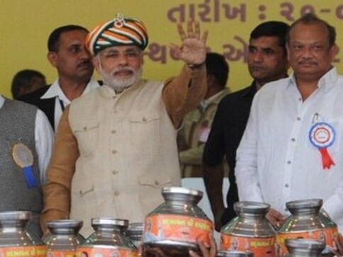 Modi criticises Centre for 'abrupt ban' on cotton export Modi criticises Centre for 'abrupt ban' on cotton export