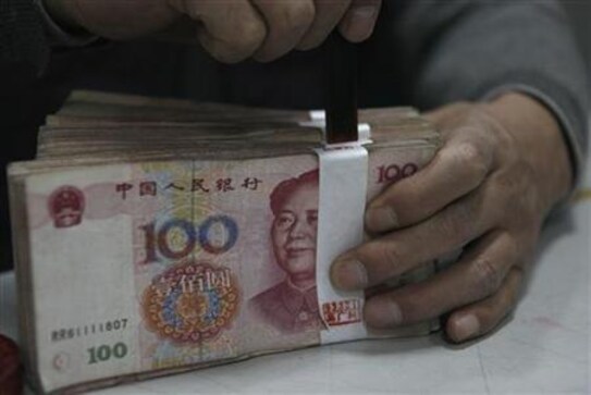 U.S. says China making progress on currency, urges more