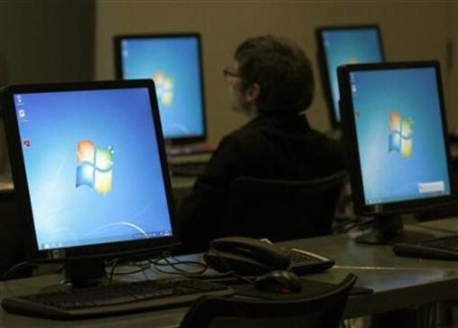 Microsoft beats Street profit view, shares up