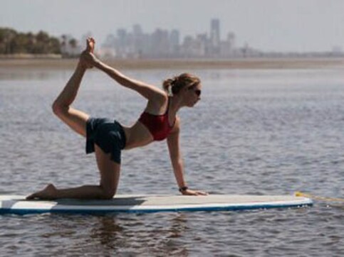 Paddle up now, it's yoga time! Paddle up now, it's yoga time!