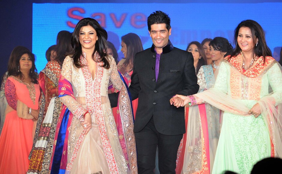 Designer Manish Malhotra, is flanked by Sushmita Sen (left) and Poonam Dhillon (right) during the Lilavati Hospital Trust's fashion show to raise money for the "Save and Empower the Girl Child" foundation. Raju Shelar/Firstpost Designer Manish Malhotra, is flanked by Sushmita Sen (left) and Poonam Dhillon (right) during the Lilavati Hospital Trust's fashion show to raise money for the "Save and Empower the Girl Child" foundation. Raju Shelar/Firstpost