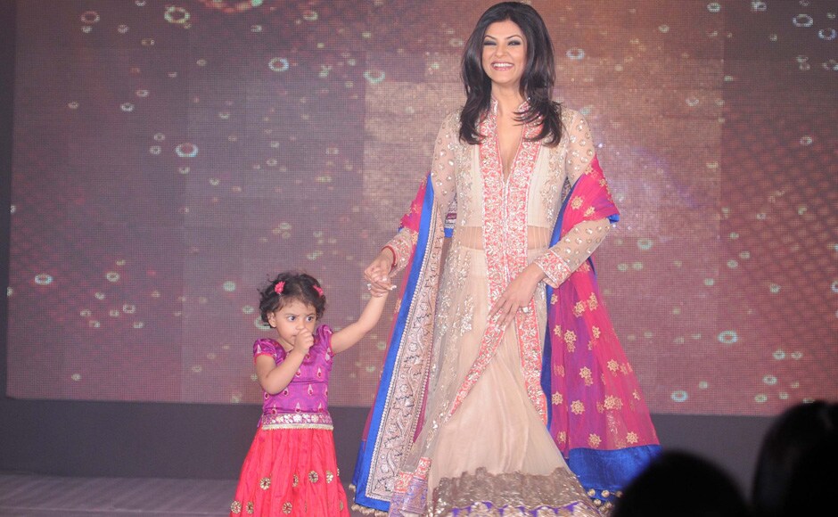 Sushmita Sen walks the ramp with daughter Alisah during a fundraiser fashion show for "Save and Empower the Girl Child" foundation. Raju Shelar/Firstpost Sushmita Sen walks the ramp with daughter Alisah during a fundraiser fashion show for "Save and Empower the Girl Child" foundation. Raju Shelar/Firstpost