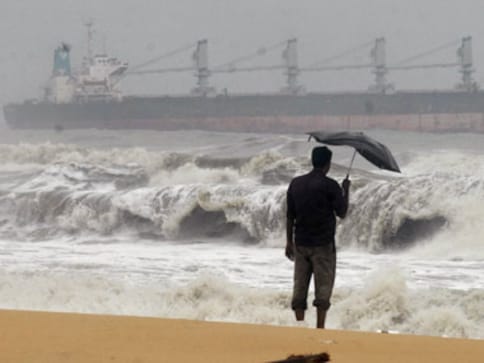 Tsunami warning scaled down, India still on alert