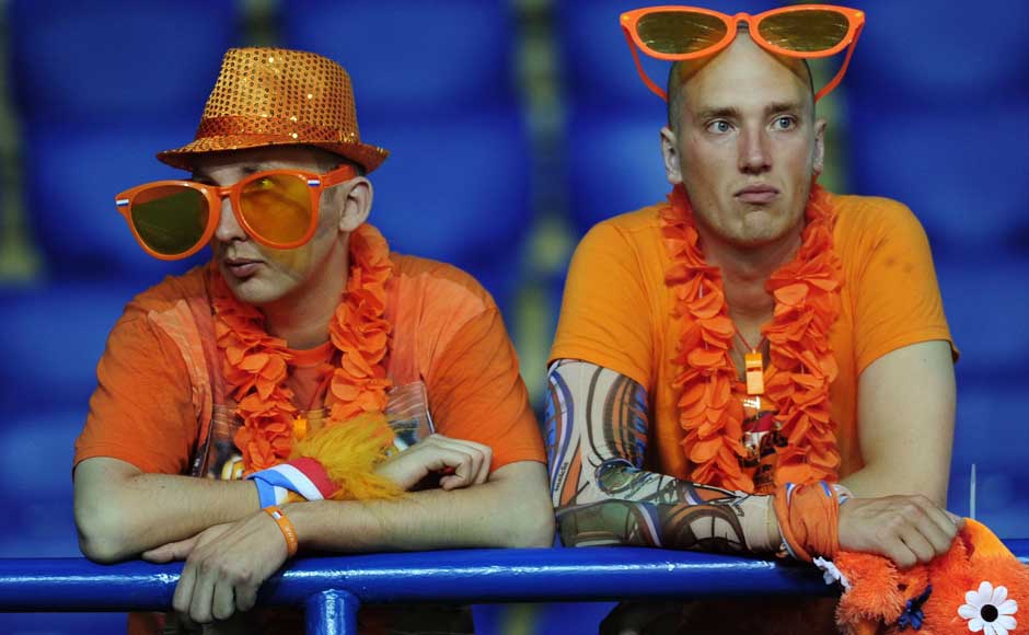 Flying down from Hawaii was a big mistake: Dutch fans react after the Euro 2012 soccer championship Group B match between the Netherlands and Germany. AP Flying down from Hawaii was a big mistake: Dutch fans react after the Euro 2012 soccer championship Group B match between the Netherlands and Germany. AP
