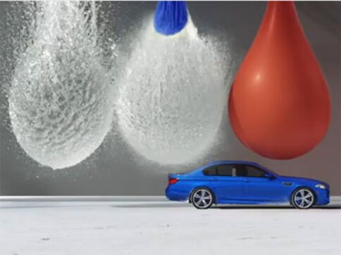 Viral Video: BMW recreates super slow bullet motion with Sedan