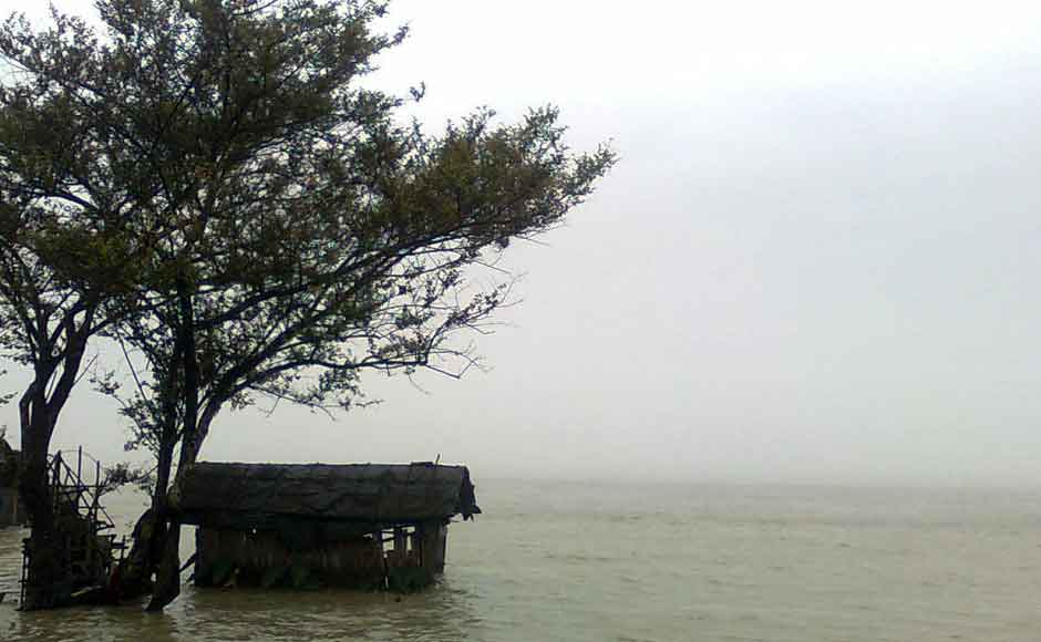 A thatched hut ravaged by the Brahmaputra in Dibrugarh district of Assam on Tuesday. Image courtesy Alok Kar Dowerah A thatched hut ravaged by the Brahmaputra in Dibrugarh district of Assam on Tuesday. Image courtesy Alok Kar Dowerah