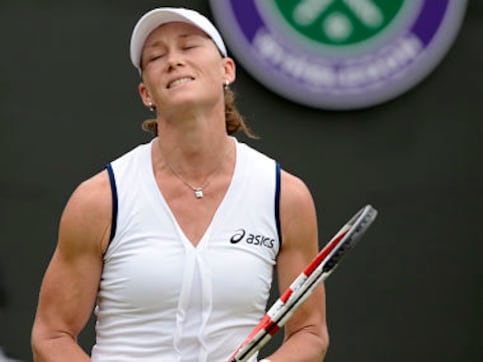 Stosur crashes out of Wimbledon after loss to Rus Stosur crashes out of Wimbledon after loss to Rus