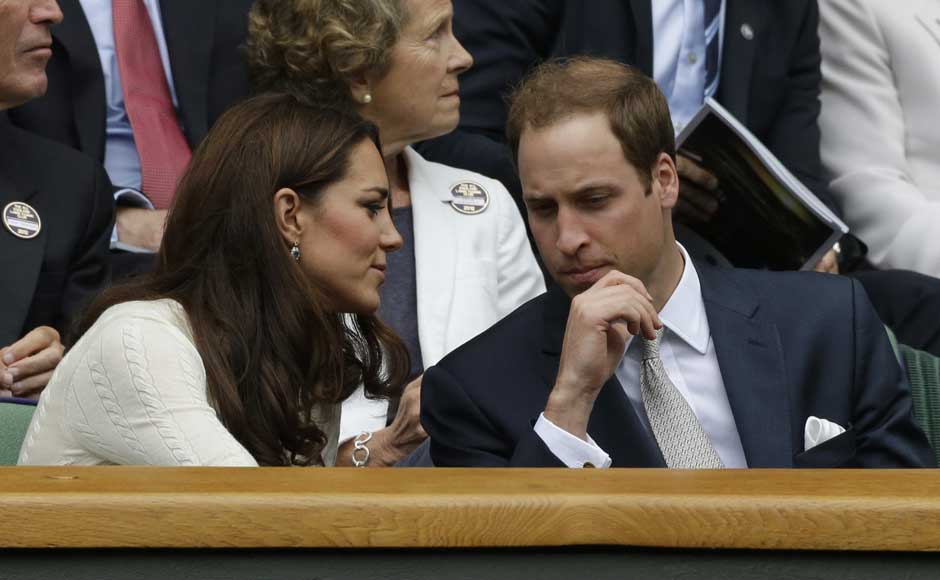 Britain's Prince William, right, and his wife Kate, Duchess of Cambridge applaud ahead of a quarterfinals match between Roger Federer of Switzerland and Mikhail Youzhny of Russia. AP Britain's Prince William, right, and his wife Kate, Duchess of Cambridge applaud ahead of a quarterfinals match between Roger Federer of Switzerland and Mikhail Youzhny of Russia. AP