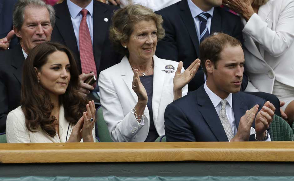 Britain's Prince William, right, and his wife Kate, Duchess of Cambridge applaud ahead of a quarterfinals match between Roger Federer of Switzerland and Mikhail Youzhny of Russia. AP Britain's Prince William, right, and his wife Kate, Duchess of Cambridge applaud ahead of a quarterfinals match between Roger Federer of Switzerland and Mikhail Youzhny of Russia. AP