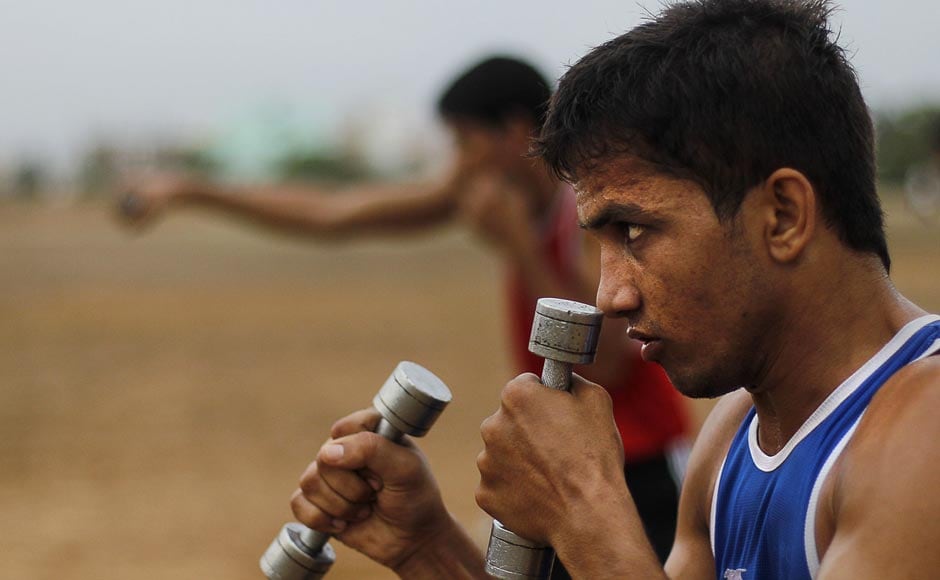 An amateur boxer from Bhiwani Boxing Club practices shadow boxing during a training session in Bhiwani. AP An amateur boxer from Bhiwani Boxing Club practices shadow boxing during a training session in Bhiwani. AP