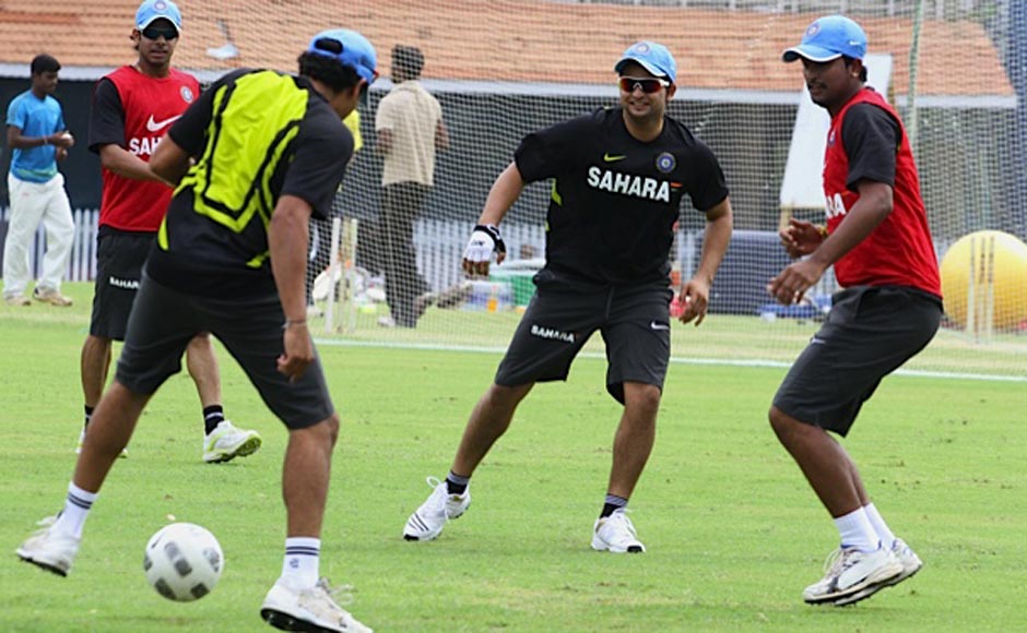 Suresh Raina, Manoj Tewari in red towards left, and Pragyan Ojha during practice. Firstpost Suresh Raina, Manoj Tewari in red towards left, and Pragyan Ojha during practice. Firstpost