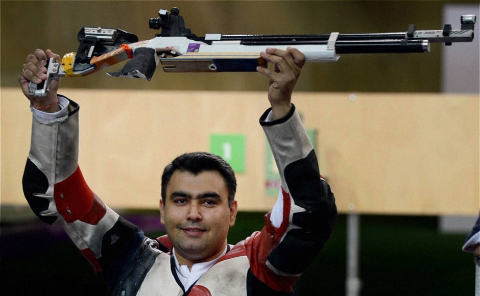 Indian shooter Gagan Narang poses for photographs after winning bronze in 10m air rifle event at the Olympic Games 2012. PTI Indian shooter Gagan Narang poses for photographs after winning bronze in 10m air rifle event at the Olympic Games 2012. PTI