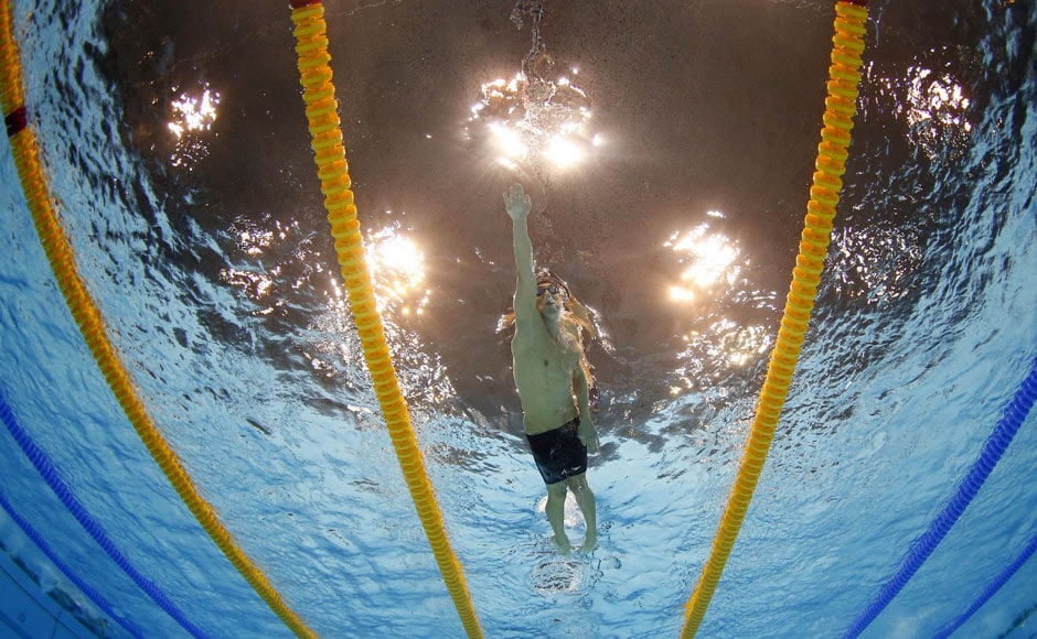United States' Michael Phelps competes in the men's 4x200-meter freestyle relay swimming final at the Aquatics Centre in the Olympic Park . Mark J Terrill/AP United States' Michael Phelps competes in the men's 4x200-meter freestyle relay swimming final at the Aquatics Centre in the Olympic Park . Mark J Terrill/AP
