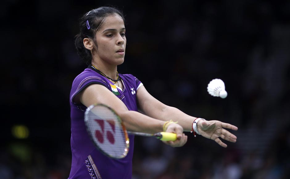 Saina Nehwal serves while playing against Netherlands' Yao Jie, unseen, at a women's singles badminton match. Saurabh Das/AP Saina Nehwal serves while playing against Netherlands' Yao Jie, unseen, at a women's singles badminton match. Saurabh Das/AP