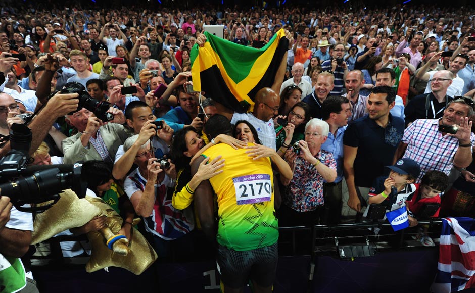 Usain Bolt of Jamaica celebrates with the crowd after winning gold in the Men's 200m Final. Stu Forster/Getty Images Usain Bolt of Jamaica celebrates with the crowd after winning gold in the Men's 200m Final. Stu Forster/Getty Images