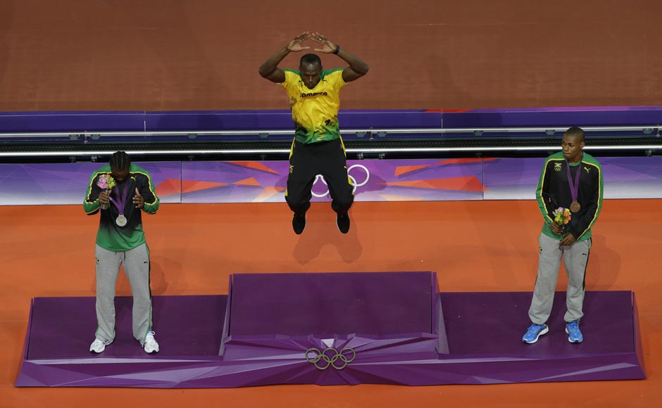 Jamaica's Usain Bolt (C) jumps on the podium with his gold medal as compatriots Yohan Blake shows his silver medal and Warren Weir (R) shows his bronze during the presentation ceremony for the men's 200m event at the London 2012 Olympic Games at the Olympic Stadium. Cathal McNaughton/Reuters Jamaica's Usain Bolt (C) jumps on the podium with his gold medal as compatriots Yohan Blake shows his silver medal and Warren Weir (R) shows his bronze during the presentation ceremony for the men's 200m event at the London 2012 Olympic Games at the Olympic Stadium. Cathal McNaughton/Reuters