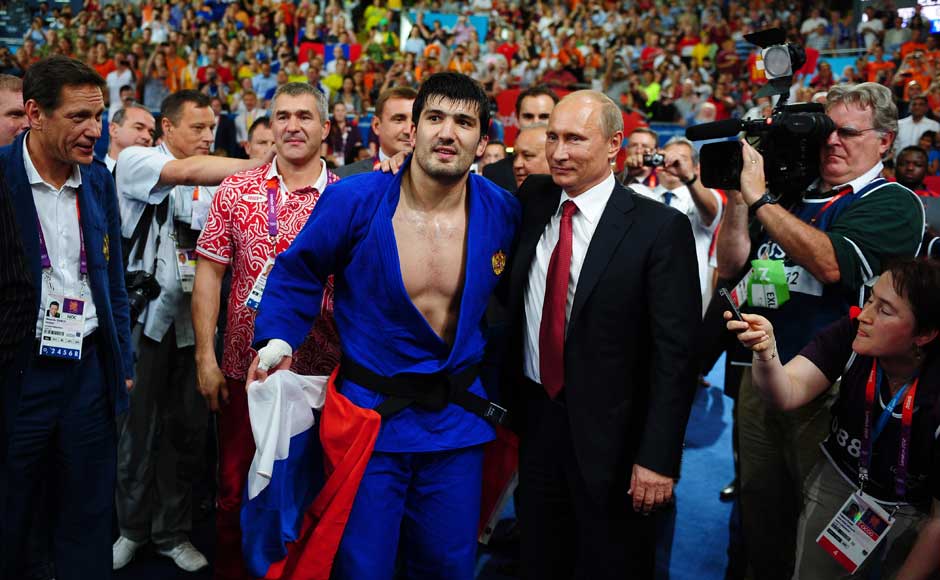 Russian President Vladimir Putin (C) congratulates Tagir Khaibulaev of Russia's after he won the gold medal in the Men's -100 kg Judo at the London Olympics. Laurence Griffiths/Getty Images Russian President Vladimir Putin (C) congratulates Tagir Khaibulaev of Russia's after he won the gold medal in the Men's -100 kg Judo at the London Olympics. Laurence Griffiths/Getty Images