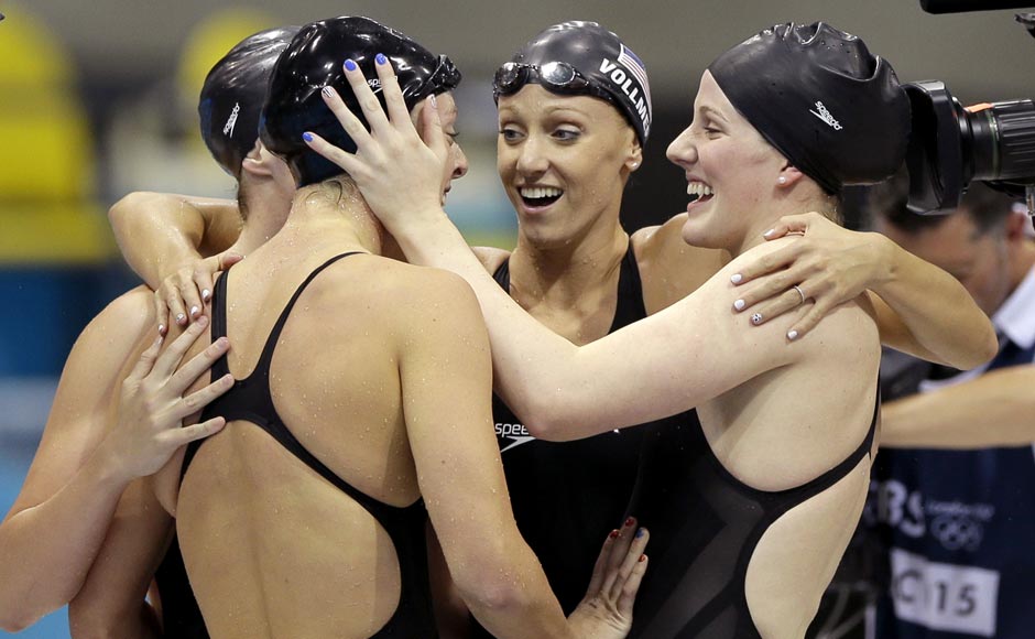 United States' Shannon Vreeland, left, and Missy Franklin, right, embrace Allison Schmitt, foreground, and Dana Vollmer, center, after they won gold in the women's 4x200-meter freestyle relay swimming final at the Aquatics Centre. Matt Slocum/AP United States' Shannon Vreeland, left, and Missy Franklin, right, embrace Allison Schmitt, foreground, and Dana Vollmer, center, after they won gold in the women's 4x200-meter freestyle relay swimming final at the Aquatics Centre. Matt Slocum/AP