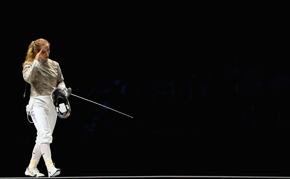 Mariel Zagunis of the United States is upset after losing in the Women's Sabre Individual Fencing Semi Final against Jiyeon Kim of South Korea on Day 5 of the London 2012 Olympic Games<strong>.</strong> She was the defending Olympic champion in the event. Hannah Johnston/Getty Images Mariel Zagunis of the United States is upset after losing in the Women's Sabre Individual Fencing Semi Final against Jiyeon Kim of South Korea on Day 5 of the London 2012 Olympic Games<strong>.</strong> She was the defending Olympic champion in the event. Hannah Johnston/Getty Images