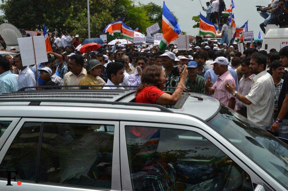 A passerby takes a photograph of the rally in south Mumbai. Parag Shinde/ Firstpost A passerby takes a photograph of the rally in south Mumbai. Parag Shinde/ Firstpost