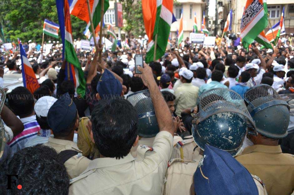 A curious policeman takes a photograph of the protest rally organised by the MNS. Parag Shinde/ Firstpost A curious policeman takes a photograph of the protest rally organised by the MNS. Parag Shinde/ Firstpost