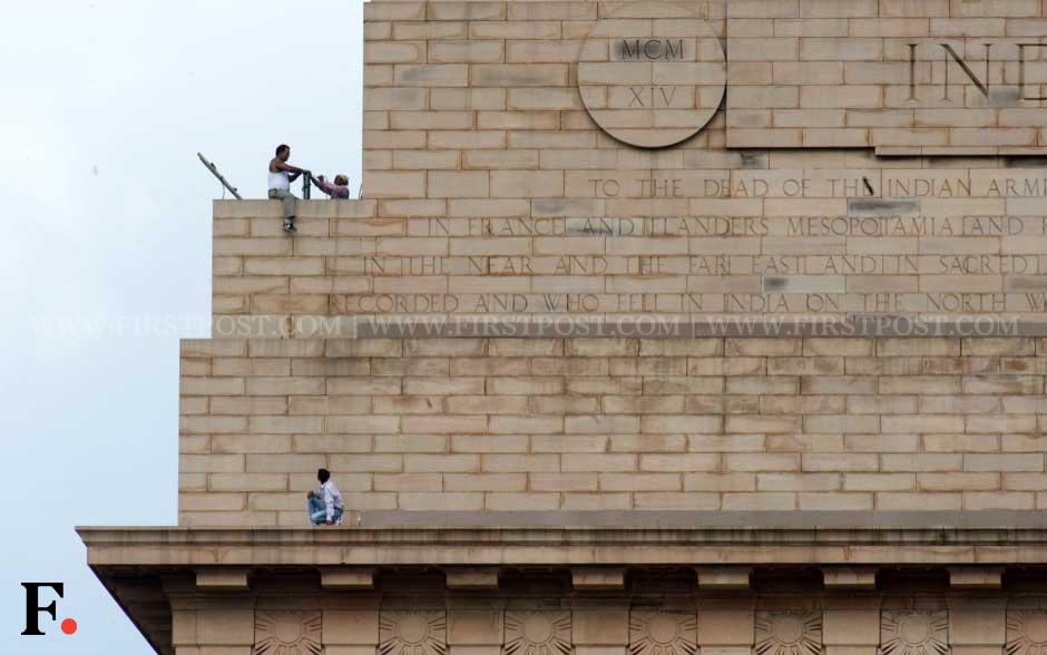 Workers ready the lighting atop India Gate. Naresh Sharma/ Firstpost Workers ready the lighting atop India Gate. Naresh Sharma/ Firstpost