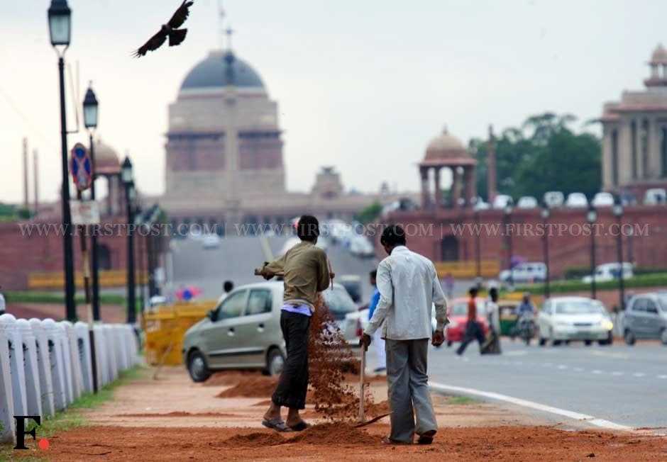Workers on Rajpath in Delhi ahead of Independence Day. Naresh Sharma/ Firstpost Workers on Rajpath in Delhi ahead of Independence Day. Naresh Sharma/ Firstpost