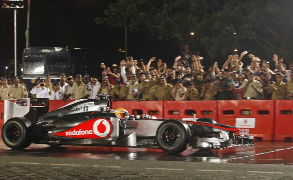 British Formula One driver Lewis Hamilton, currently racing for the McLaren team, drives an F1 car during Vodafone Speed Fest, a promotional event in Mumbai. Rajanish Kakade/AP British Formula One driver Lewis Hamilton, currently racing for the McLaren team, drives an F1 car during Vodafone Speed Fest, a promotional event in Mumbai. Rajanish Kakade/AP