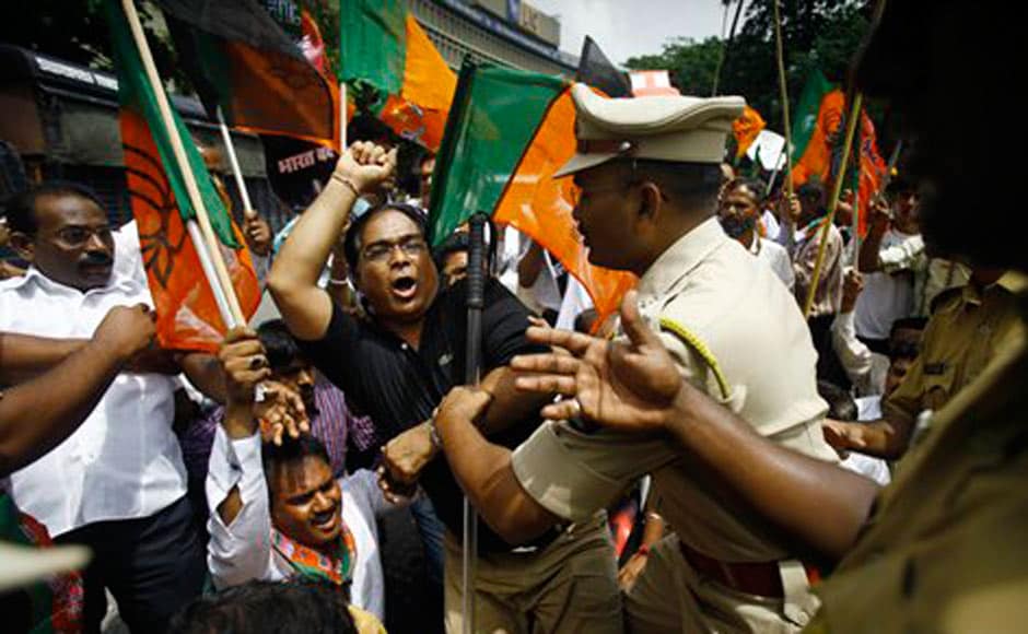 Police detain activists of the Bharatiya Janata Party during a protest in Mumbai. AP Police detain activists of the Bharatiya Janata Party during a protest in Mumbai. AP