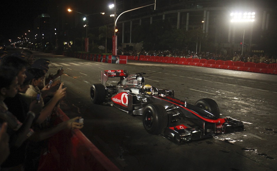 McLaren Formula One driver Lewis Hamilton of Britain drives his F1 car down the BKC road in Mumbai. Danish Siddiqui/Reuters McLaren Formula One driver Lewis Hamilton of Britain drives his F1 car down the BKC road in Mumbai. Danish Siddiqui/Reuters