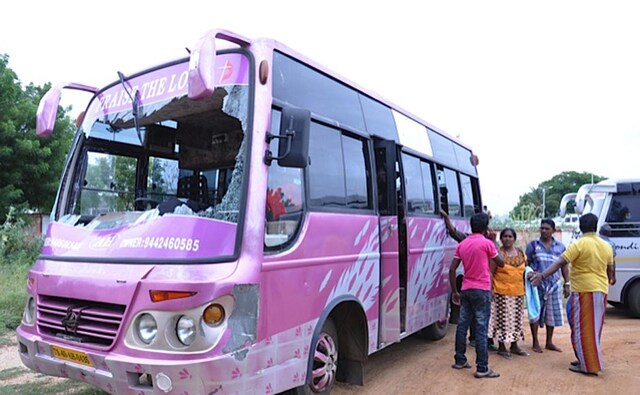 Sri Lankan pilgrims stand outside a bus that attacked. Firstpost Sri Lankan pilgrims stand outside a bus that attacked. Firstpost