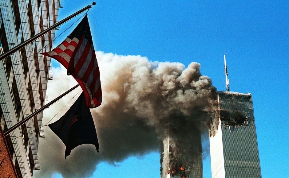 Smoke pours from the World Trade Center after being hit by two planes 11 September 2001 in New York City. Craig Allen/Getty Images Smoke pours from the World Trade Center after being hit by two planes 11 September 2001 in New York City. Craig Allen/Getty Images
