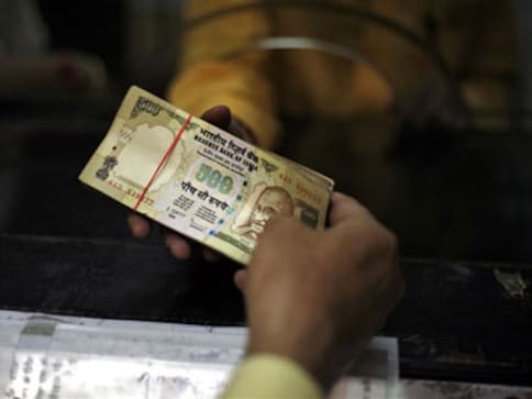 Rupee soars to four-month high on reforms, hopes for more FII Rupee soars to four-month high on reforms, hopes for more FII
