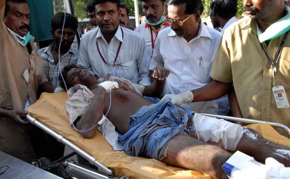 n injured person is rushed for treatment after a massive blaze swept through a fireworks factory in Sivakasi on Wednesday. PTI n injured person is rushed for treatment after a massive blaze swept through a fireworks factory in Sivakasi on Wednesday. PTI