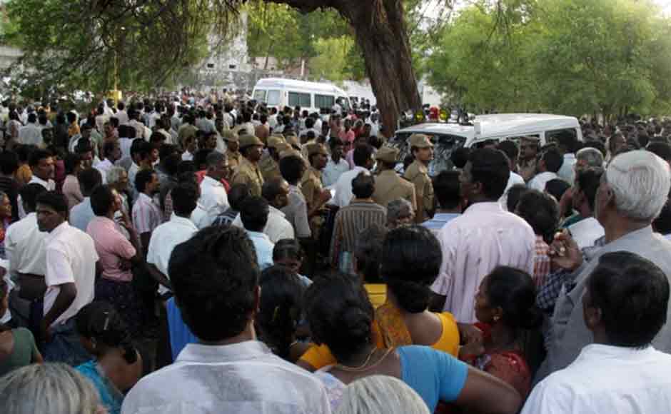 Policemen at the site of a devastating blaze that raged through a fireworks factory on the outskirts of Sivakasi, Tamil Nadu on Wednesday. Firstpost Policemen at the site of a devastating blaze that raged through a fireworks factory on the outskirts of Sivakasi, Tamil Nadu on Wednesday. Firstpost
